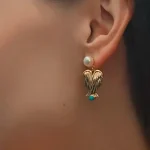 ear-piercing-jewelry-asymmetric-wings-leaf-ear-stud-1 gold earrings
