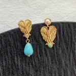 ear-piercing-jewelry-asymmetric-wings-leaf-ear-stud-2 gold earrings