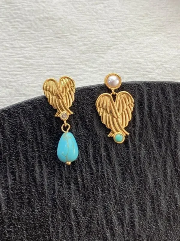 ear-piercing-jewelry-asymmetric-wings-leaf-ear-stud-2 gold earrings