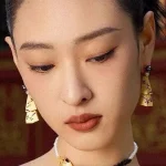 ear-piercing-jewelry-chinese-bell-ear-studs-2 gold earrings