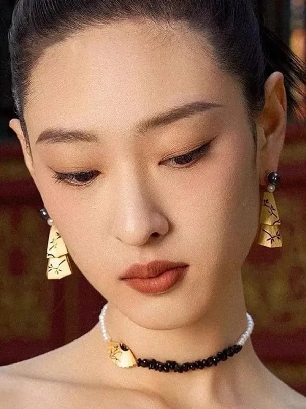 ear-piercing-jewelry-chinese-bell-ear-studs-2 gold earrings