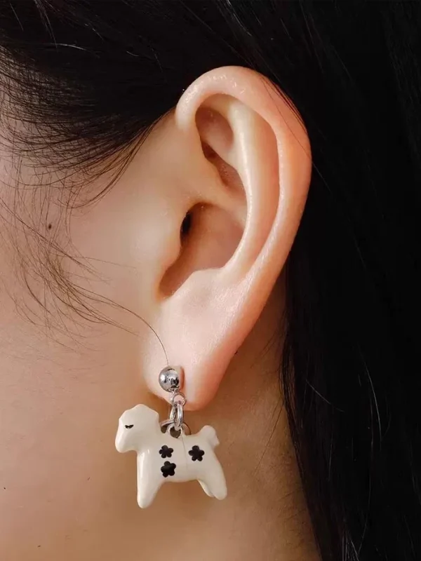 ear-piercing-jewelry-enamel-pony-ear-studs-1 Material: enamel, sliver stud Color: white Quantity: 1 pair/ set