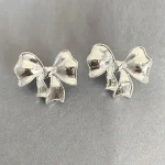 ear-piercing-jewelry-equisite-bow-leaf-ear-studs-2 ear jewellery