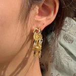ear-piercing-jewelry-knot-sun-ear-rings-1 gold earrings