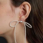 ear-piercing-jewelry-pearl-bow-ear-studs-2 ear jewellery