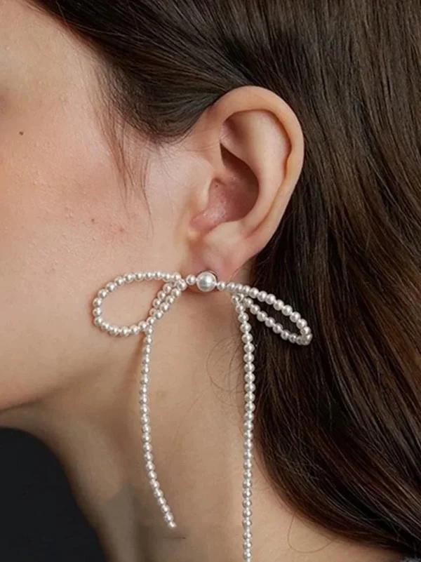 ear-piercing-jewelry-pearl-bow-ear-studs-2 ear jewellery