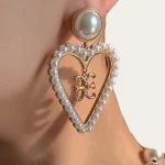 ear-piercing-jewelry-pearl-heart-ear-studs-1 pearl earrings