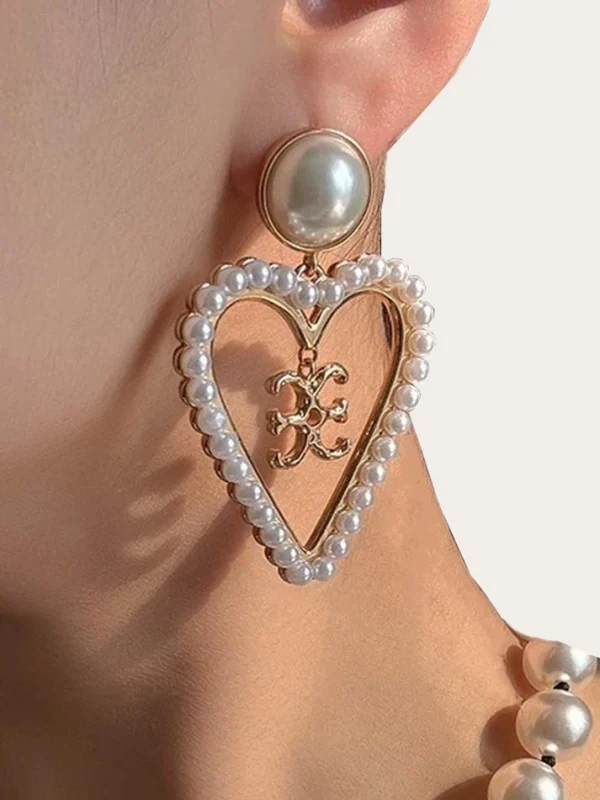 ear-piercing-jewelry-pearl-heart-ear-studs-1 pearl earrings