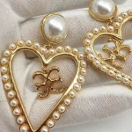 ear-piercing-jewelry-pearl-heart-ear-studs-3 pearl earrings