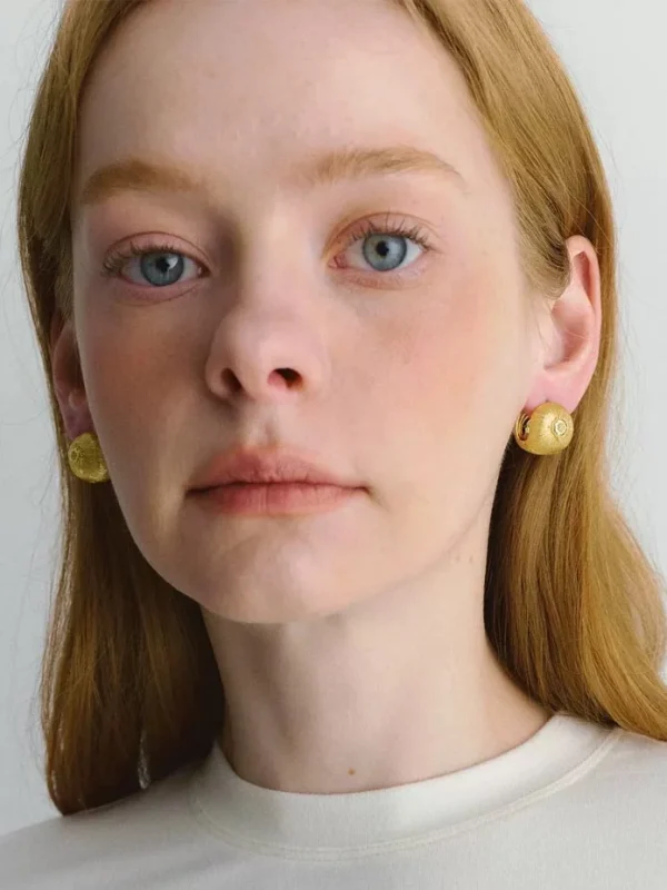 ear-piercing-jewelry-round-daisy-ear-studs-3 gold earrings