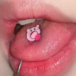 body-jeweller-cute-tongue-stud-2 Bubbleoo cute pink animal tongue stud worn in mouth