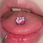 body-jeweller-cute-tongue-stud-3 Bubbleoo cute pink animal tongue stud worn in mouth