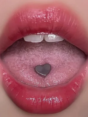 body-jeweller-heart-tongue-stud-1 Silver heart design tongue stud model shot - Bubbleoo