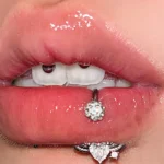body-jeweller-wing-piercing-rings-2 Sparkling diamond wing lip piercing rings with gems
