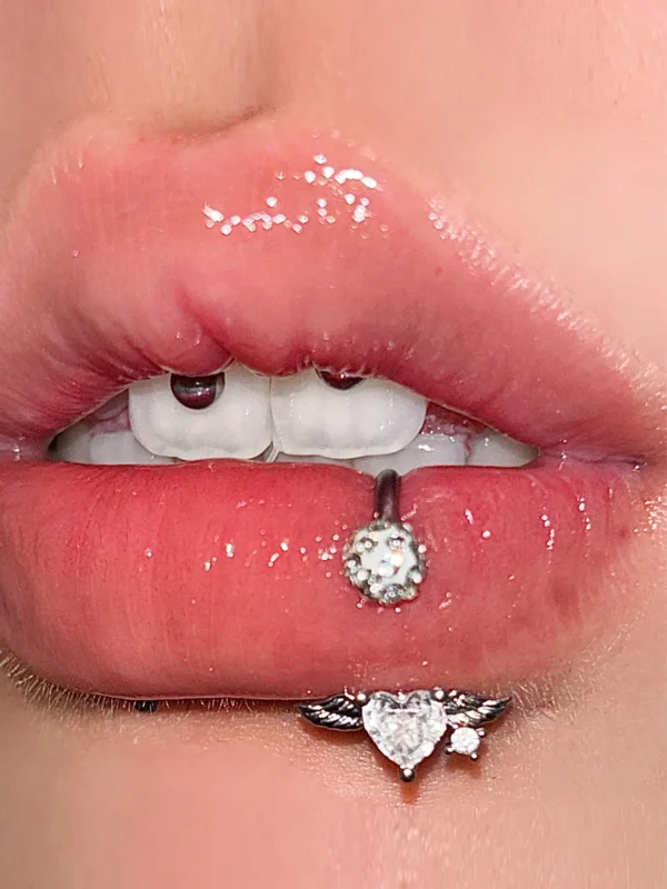 body-jeweller-wing-piercing-rings-2 Sparkling diamond wing lip piercing rings with gems