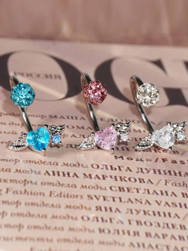 body-jeweller-wing-piercing-rings-3 Sparkling diamond wing lip piercing rings with gems