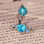 body-jeweller-wing-piercing-rings-4 Sparkling diamond wing lip piercing rings with gems
