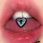 body-jewellery-heart-cross-tongue-stud-2 Heart shaped cross tongue stud model shot - Bubbleoo