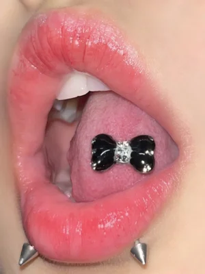body-jewellery-shiny-bone-tongue-stud-2 Bubbleoo black bow tongue stud with gems worn in mouth